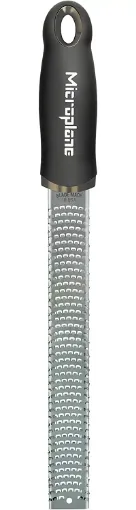 Picture of Zester grater ideal for citrus, hard cheese, ginger, chocolate and nutmeg with fine blade - black - made in usa - Microplane